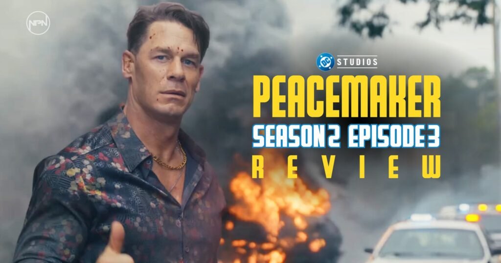 Peacemaker looking at the camera and doing thumbs up. the background is fire and smoke